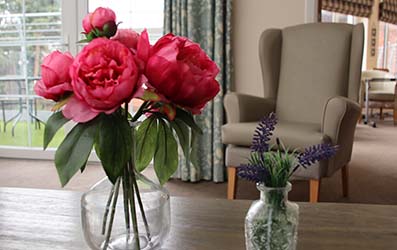 Flowers and Armchair