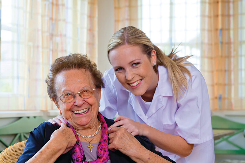 Resident and Staff Smiling