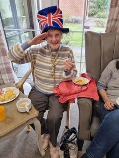 Resident Wearing British Flag Hat