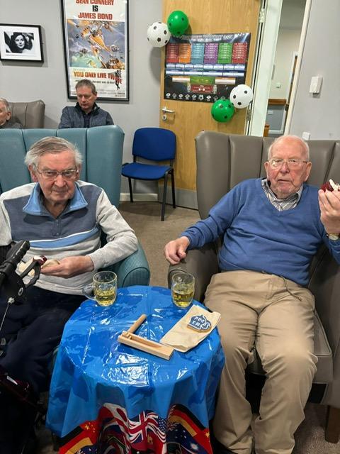 residents-watching-the-football-with-beer