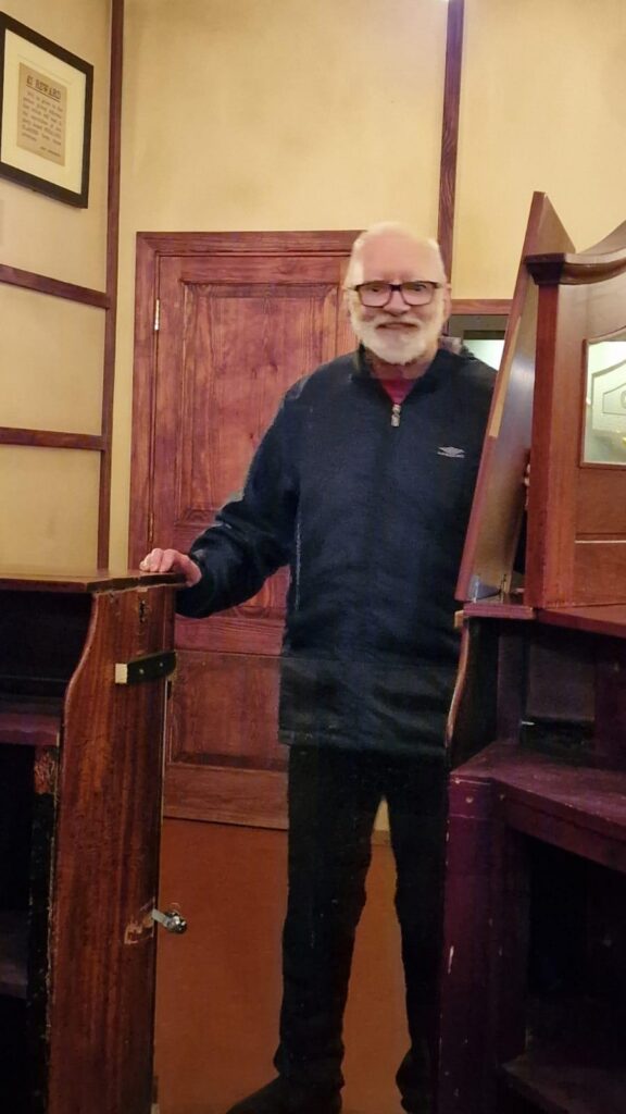 resident smiling in transport museum