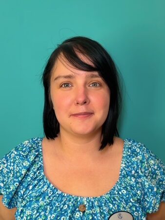woman with brown bob smiling